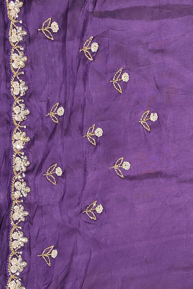Violet soft organza silk saree with intricate embroidery, party wear style, paired with an unstiched blouse from Saarang Sarees.
