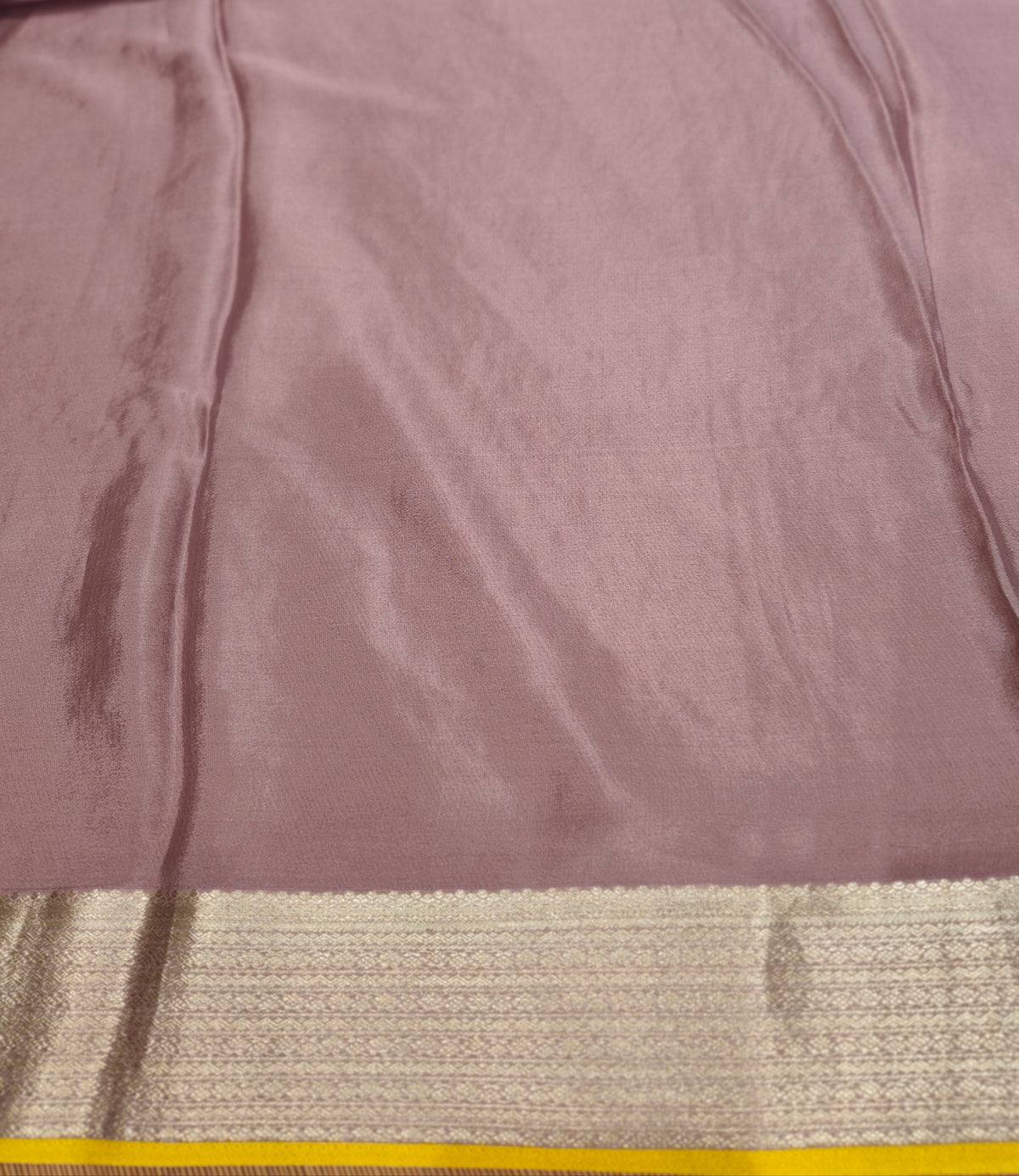 Mauve Mysore Crepe Silk Banarasi Saree with intricate gold zari work and matching unstiched blouse, traditional Indian wear by Saarang Sarees.