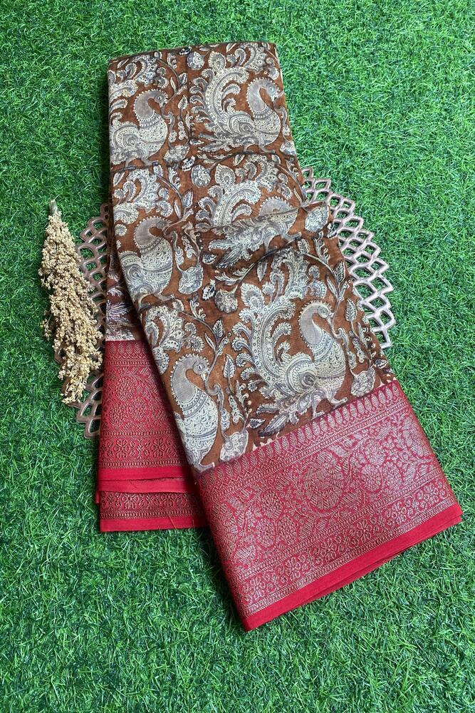 Brown cotton Chanderi saree with traditional design and matching unstiched blouse from Saarang Sarees, shown draped and styled.