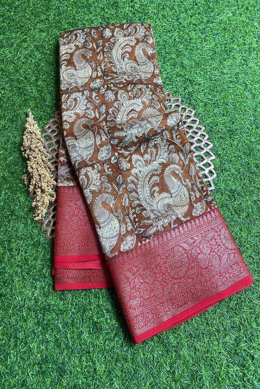 Brown cotton Chanderi saree with traditional design and matching unstiched blouse from Saarang Sarees, shown draped and styled.