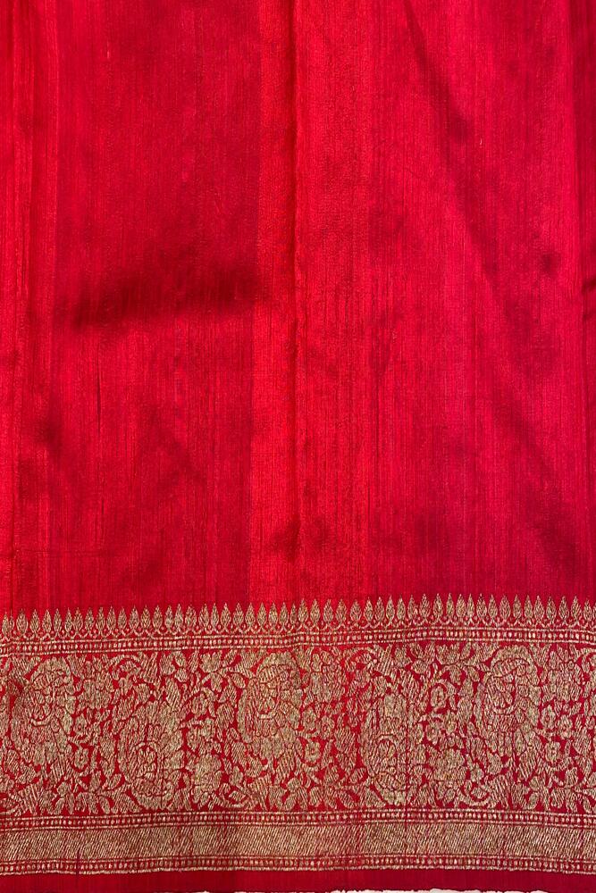 Black pure raw Tussar Banarasi silk saree with handwoven motifs and unstiched blouse, traditional wear by Saarang Sarees.