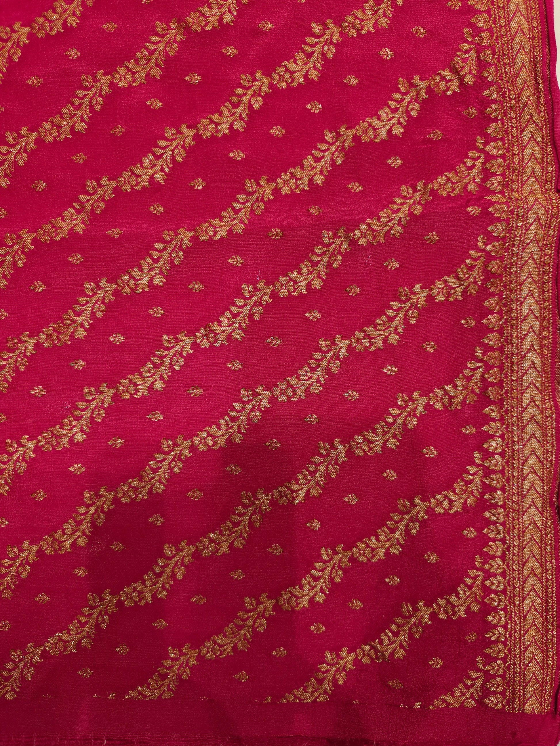 Mauve pink crepe khaddi Banarasi silk saree with intricate gold zari work and matching unstitch blouse, traditional wear by Saarang Sarees.