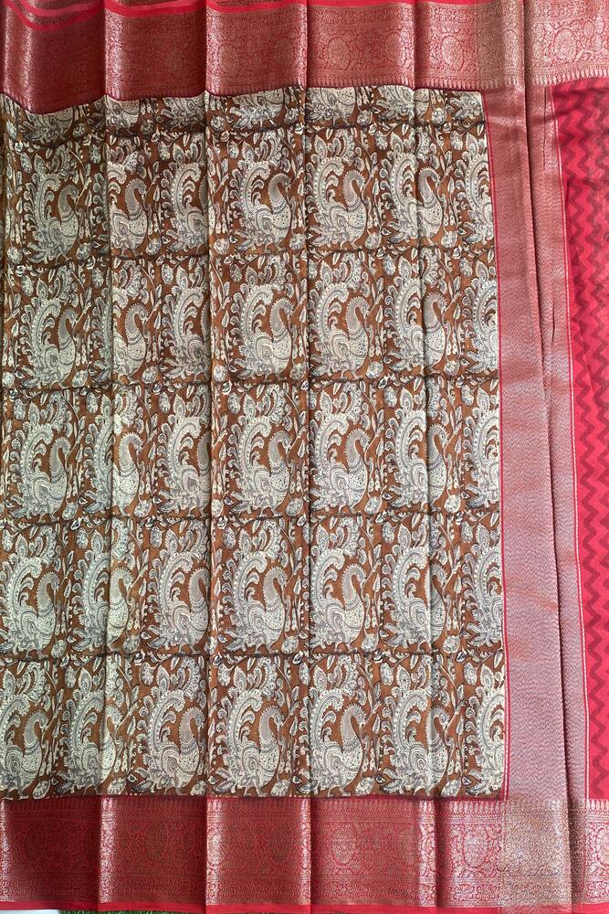 Brown cotton Chanderi saree with traditional design, paired with an unstitched blouse, from Saarang Sarees.