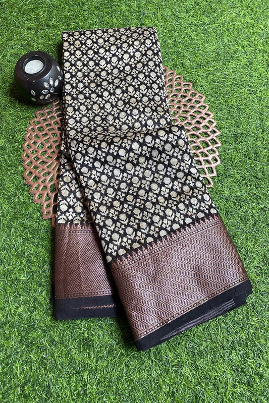 Black and white cotton Chanderi saree with an unstiched blouse from Saarang Sarees, showcasing traditional Indian craftsmanship.