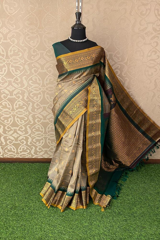 Grey Gadwal silk saree with traditional border and matching unstitched blouse, crafted by Saarang Sarees for elegant Indian wear.