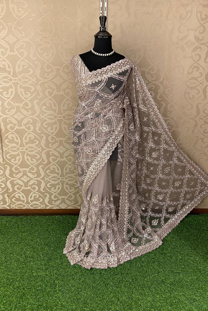 Grey party wear net embroidered saree with a matching ready-made blouse from Saarang Sarees, featuring intricate embroidery details.