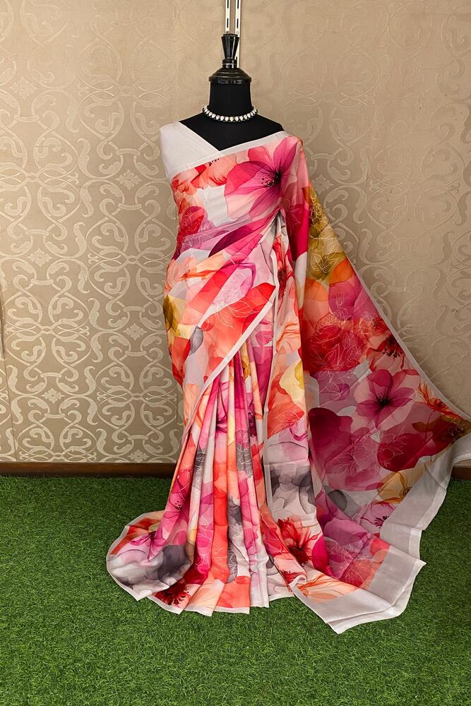 White and multi-floral printed satin crepe saree with unstiched blouse, perfect for party wear by Saarang Sarees.