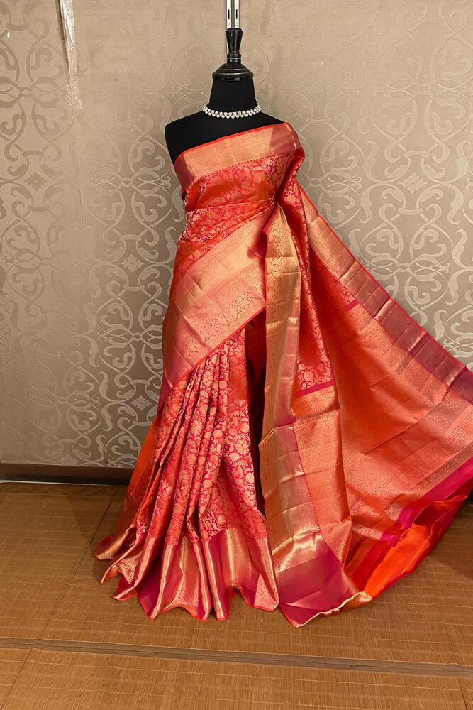 Red Pure Kanjeevaram Silk Saree with intricate gold zari work and matching unstiched blouse, traditional wear by Saarang Sarees.