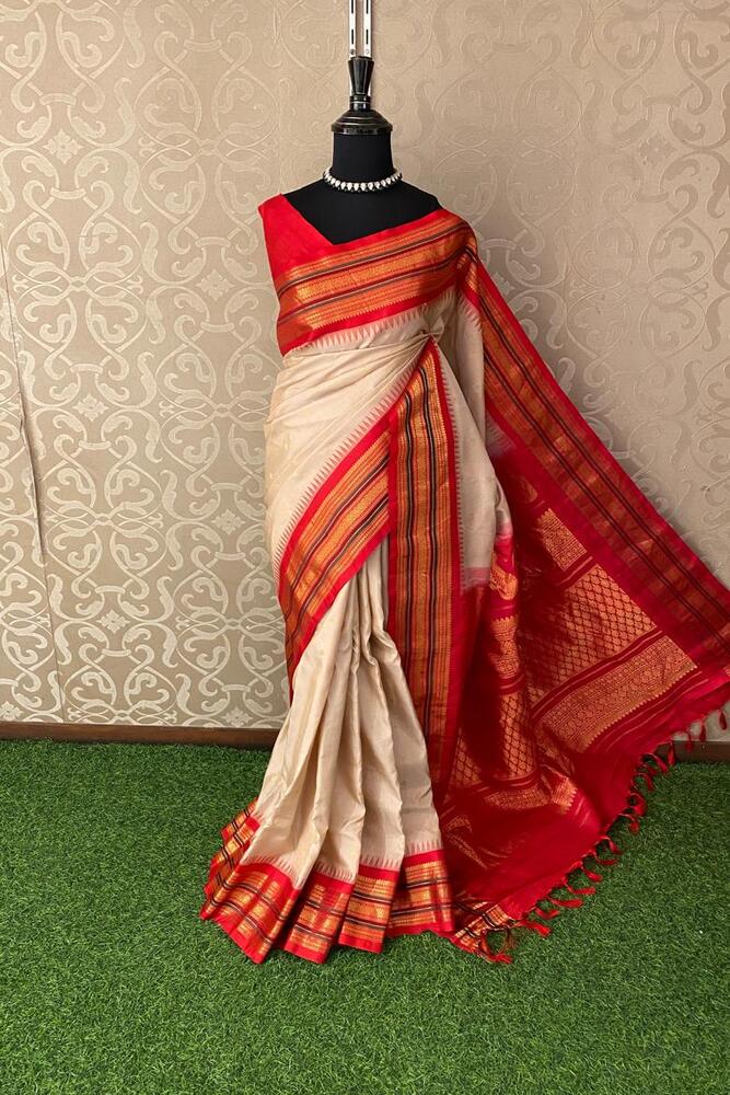 Off-White Gadwal silk saree with intricate traditional designs and unstiched blouse, crafted by Saarang Sarees.