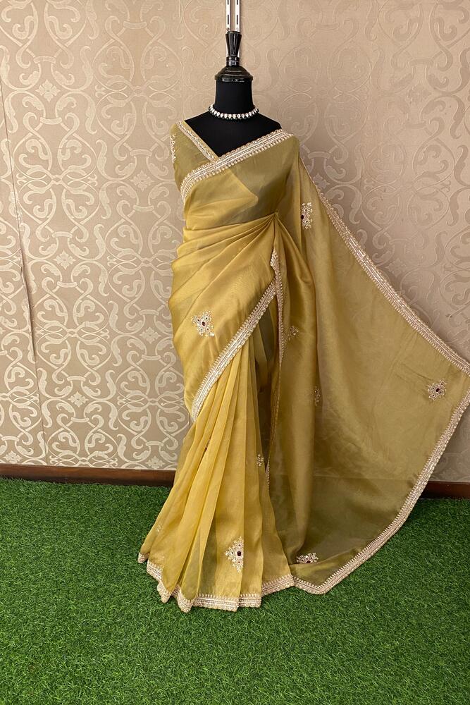 Yellow soft tissue silk embroidery saree with unstiched blouse, perfect for party wear by Saarang Sarees.