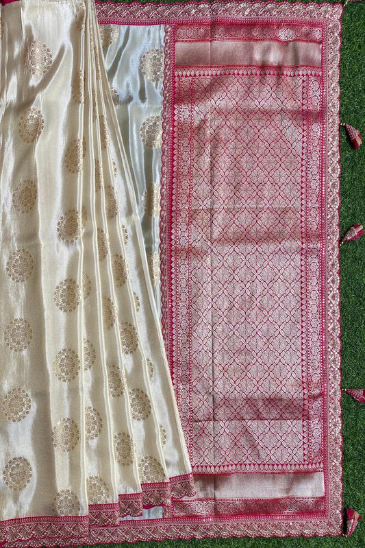 Off-White Gold Tissue Khaddi saree with embroidery border and unstiched blouse, traditional wear by Saarang Sarees.