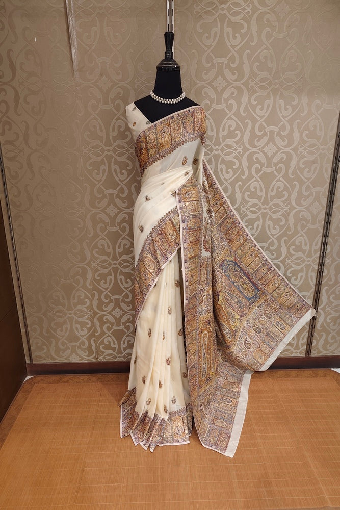 Off-White Pure Kani Handloom Silk Saree With Floral Woven Blouse