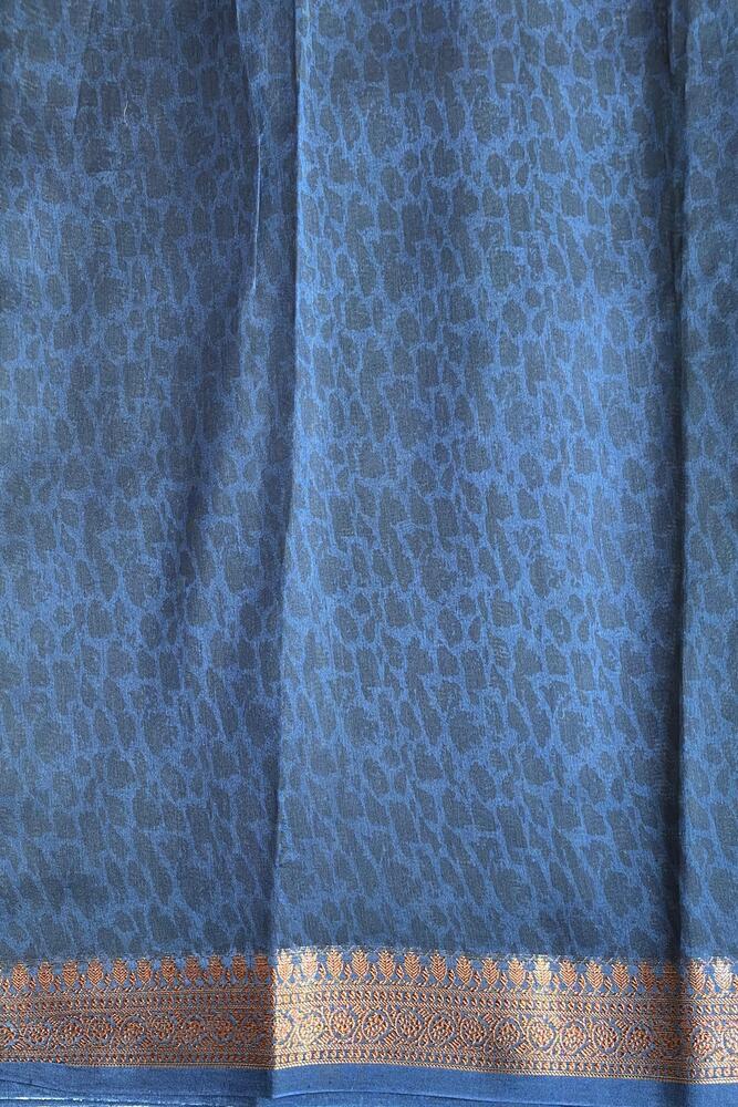 Multi blue cotton Chanderi saree with traditional design and unstitched blouse from Saarang Sarees, displayed on a hanger.