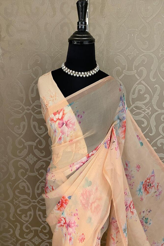 Peach floral printed chiffon saree with unstiched blouse piece, perfect for party wear by Saarang Sarees.