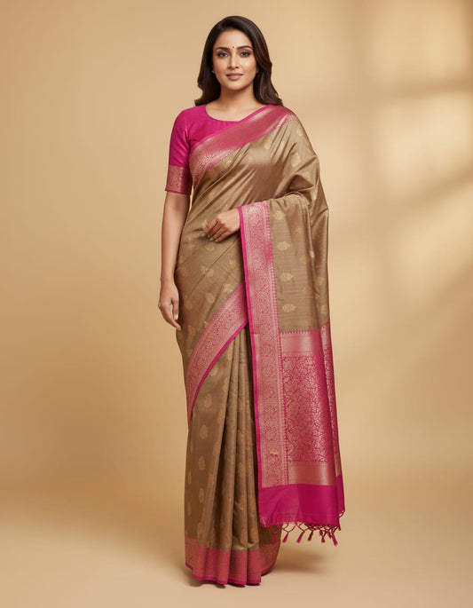 Deep beige Munga Banarasi silk saree with intricate gold zari work, paired with an unstiched matching blouse for traditional wear.