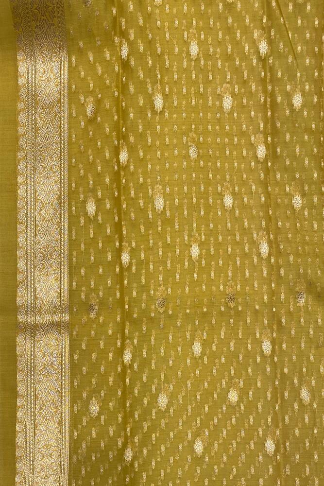 Dusty yellow Kora Banarasi silk saree with handwoven work and unstiched blouse, traditional wear by Saarang Sarees.