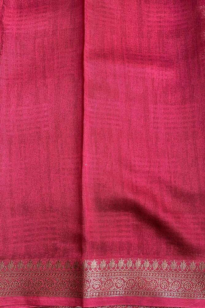 Red and white cotton Chanderi saree with unstiched blouse from Saarang Sarees, traditional wear, intricate fabric details visible.