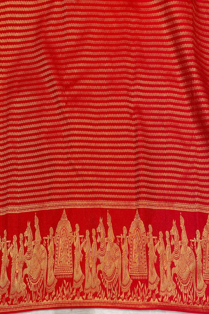 Red Pure Kanjeevaram silk saree with traditional gold zari work and matching unstiched blouse, displayed on a hanger.