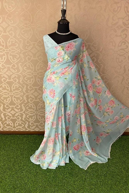 Sky floral printed chiffon saree with unstiched blouse piece, designed for party wear by Saarang Sarees.