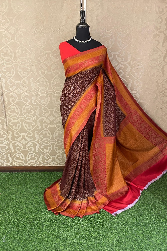 Brown Mysore crepe saree with brocade pattern, party wear style, displayed with an unstiched blouse, by Saarang Sarees.