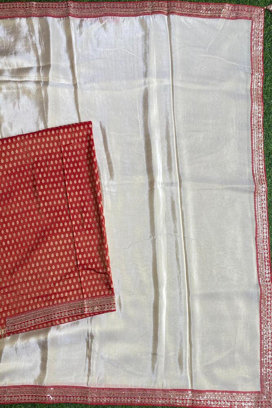 Off-White Tissue Saree with unstiched blouse, traditional Indian wear by Saarang Sarees, shown draped on a mannequin.