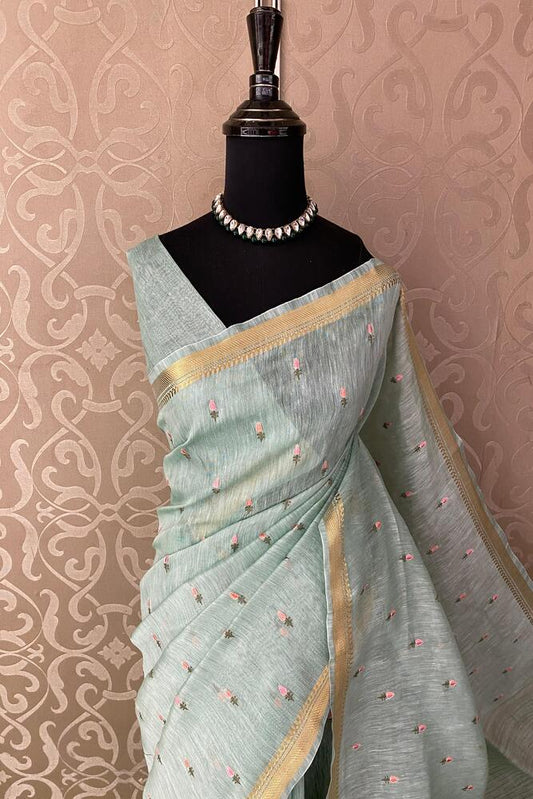 Firozi blue pure linen Kashmiri work saree with intricate embroidery and matching unstiched blouse, traditional wear by Saarang Sarees.