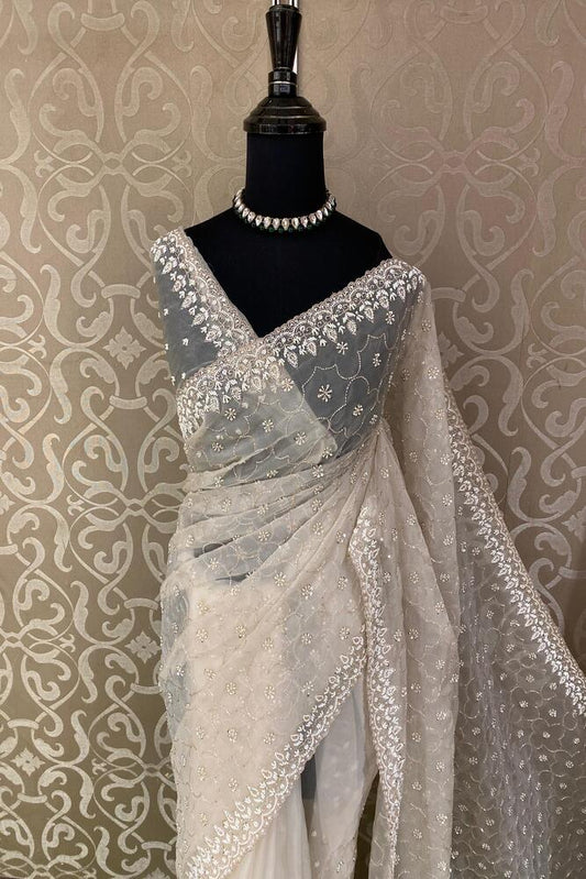 Off-White silk organza saree with embroidery for party wear, featuring an unstiched blouse, from Saarang Sarees.
