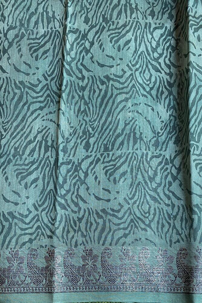 Multi cotton Chanderi saree with traditional patterns and an unstiched blouse, showcasing elegant Indian craftsmanship.