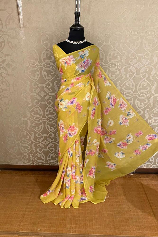 Mustard yellow floral printed chiffon saree with unstitch blouse piece, perfect for party wear by Saarang Sarees.