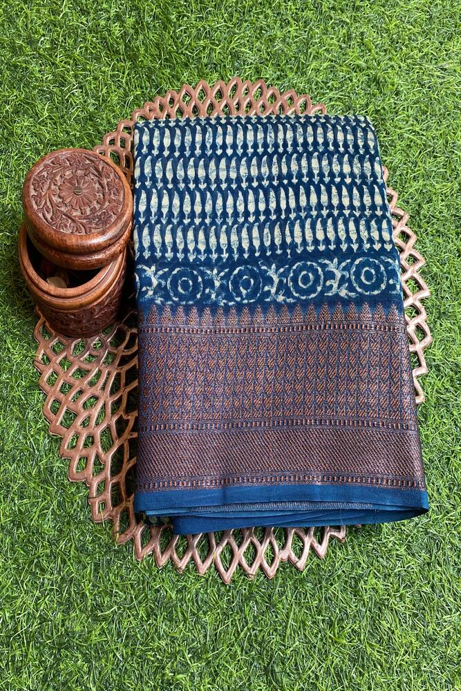 Blue cotton Chanderi saree with intricate traditional patterns, paired with an unstitched blouse, from Saarang Sarees.
