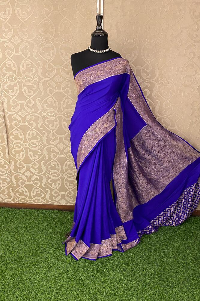 Purple Mysore Crepe Silk Banarasi Saree with traditional gold zari work and unstiched blouse, showcasing intricate silk fabric details.