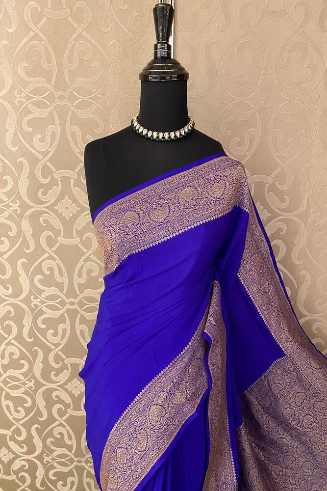 Purple Mysore Crepe Silk Banarasi saree with intricate gold zari work and matching unstiched blouse, traditional Indian wear from Saarang Sarees.