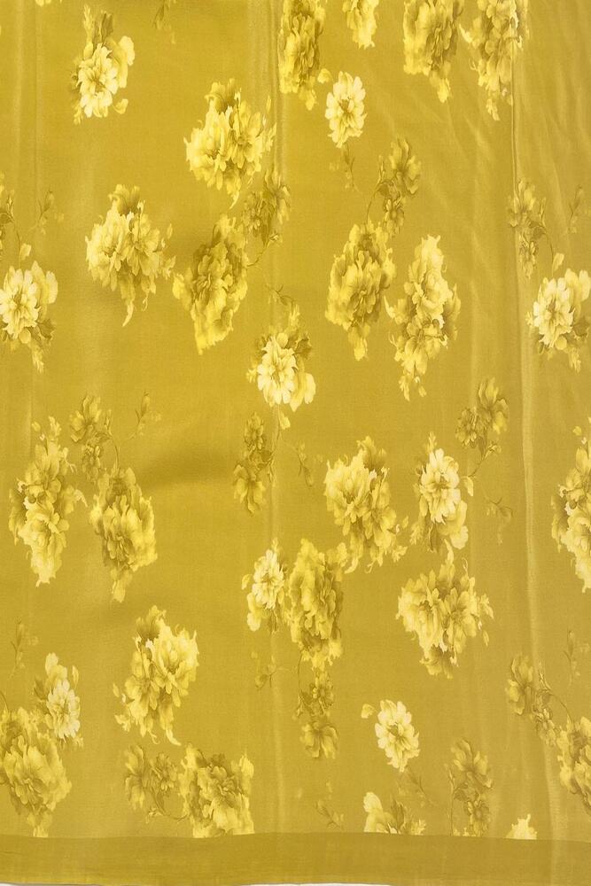 Mustard yellow floral printed chiffon saree with unstitched blouse piece, perfect for party wear by Saarang Sarees.