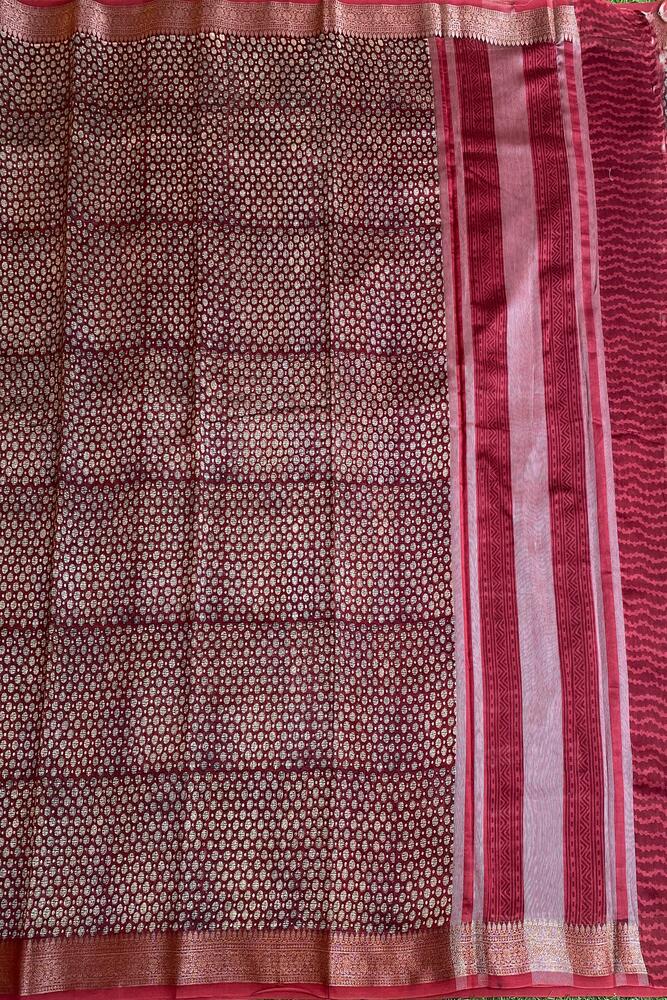 Maroon cotton Chanderi saree with intricate traditional design and matching unstiched blouse, from Saarang Sarees.