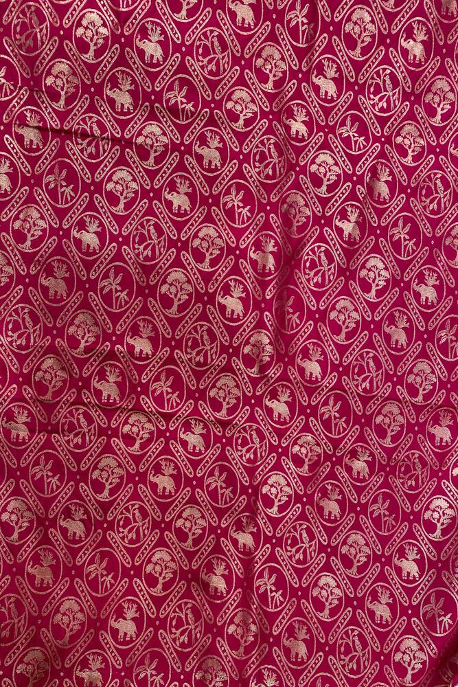White and purple tissue Banarasi silk saree with intricate gold zari work and an unstiched blouse, traditional wear by Saarang Sarees