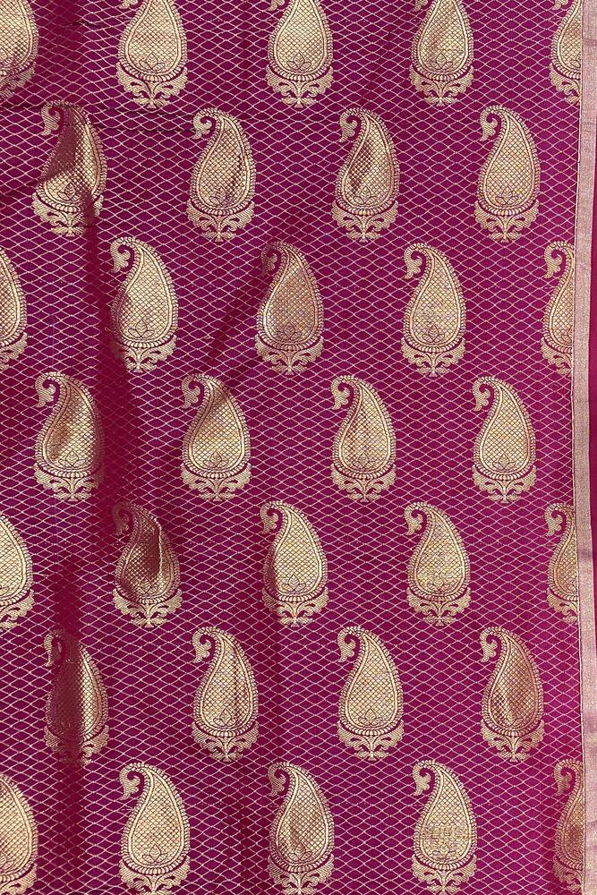 Deep Purple Katan Mashru Silk Banarasi Handloom Saree with intricate gold zari work and matching unstiched blouse from Saarang Sarees.