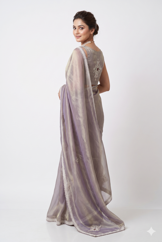 Greyish purple silk embroidery saree with soft tissue fabric and unstitched blouse, perfect for party wear by Saarang Sarees.