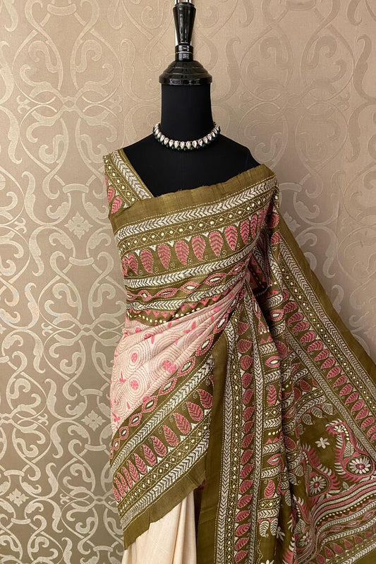 Beige Tussar embroidery saree with Kantha work border and unstitched blouse from Saarang Sarees, traditional Indian wear.