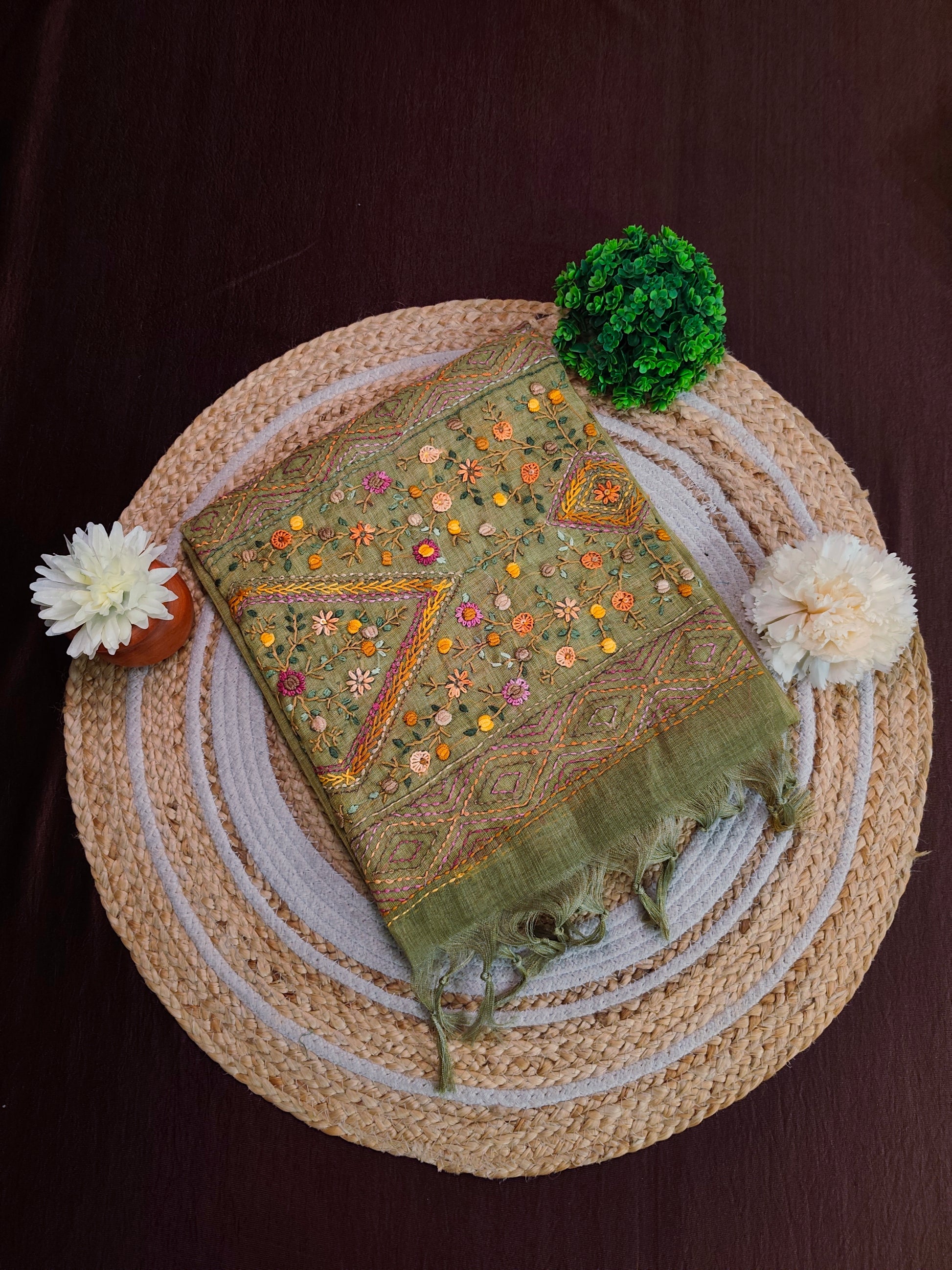 Pista green linen saree with bullion stitch work and matching unstitched blouse, traditional wear by Saarang Sarees.