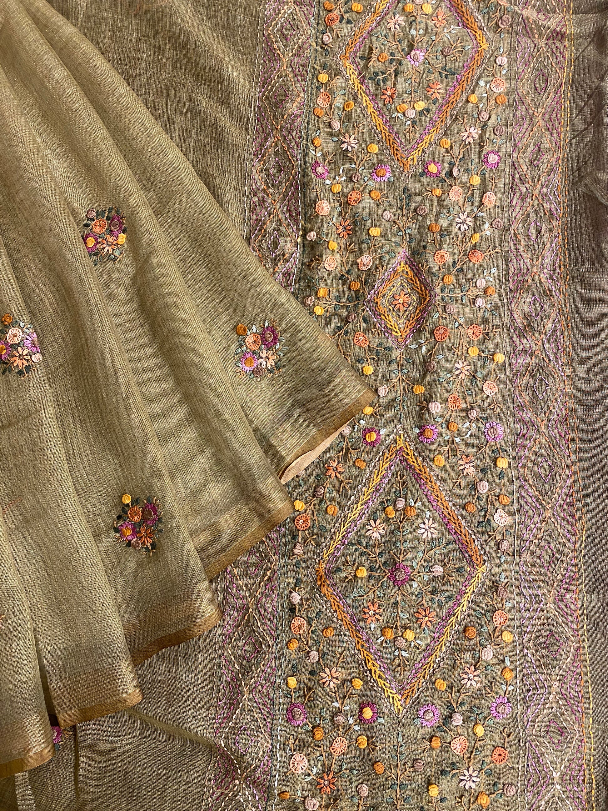 Pista green linen saree with bullion stitch work and unstitched blouse from Saarang Sarees, traditional wear with intricate embroidery.