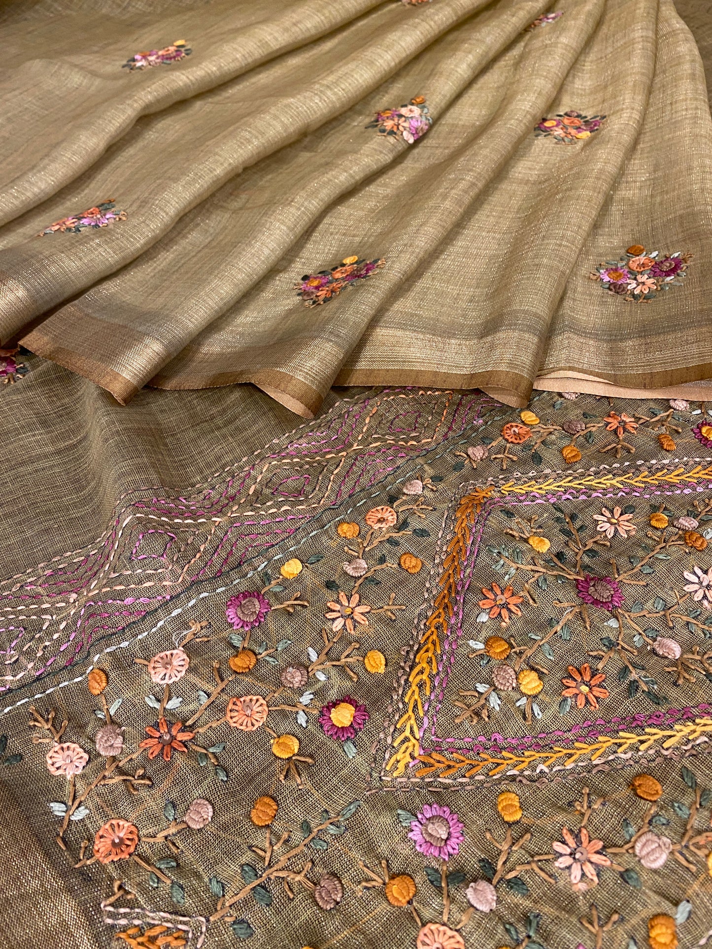 Pista green linen saree with bullion stitch work and unstiched blouse from Saarang Sarees, traditional wear displayed on a mannequin.