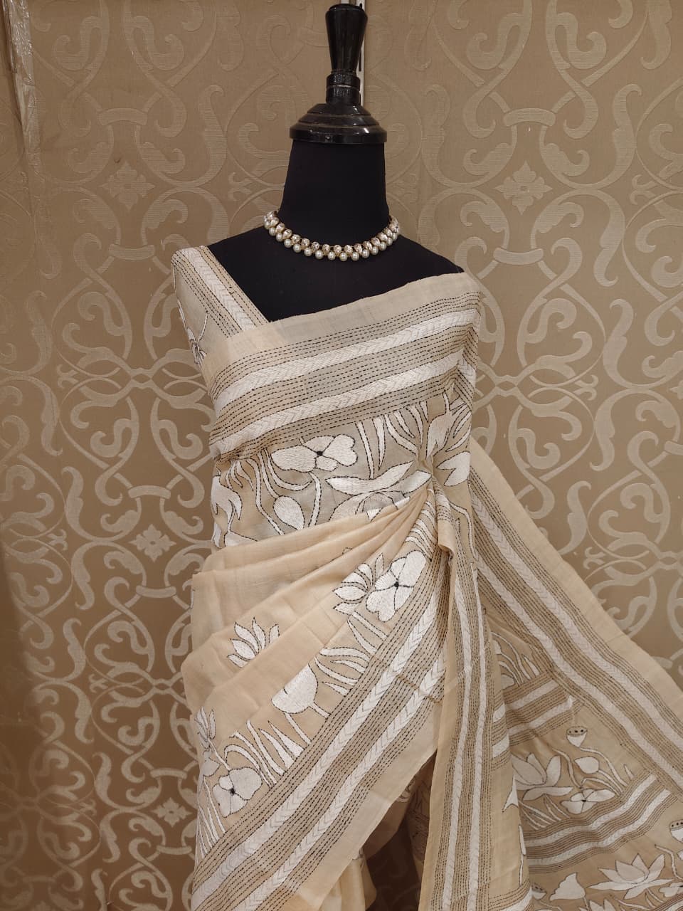Beige Tussar embroidery saree with kantha work border and unstitched blouse, traditional wear by Saarang Sarees.