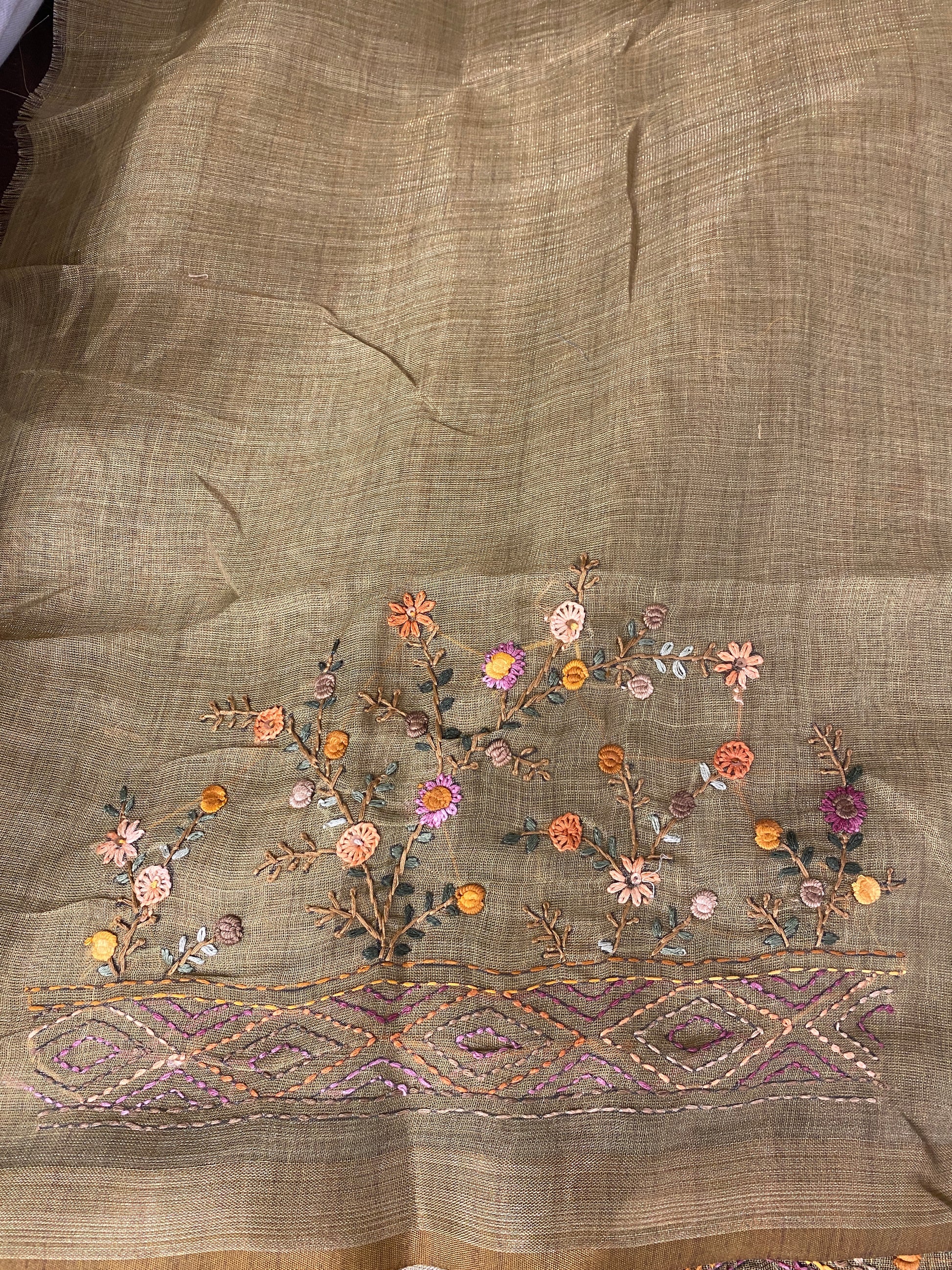 Pista green linen saree with bullion stitch work and matching unstiched blouse from Saarang Sarees, traditional Indian wear.