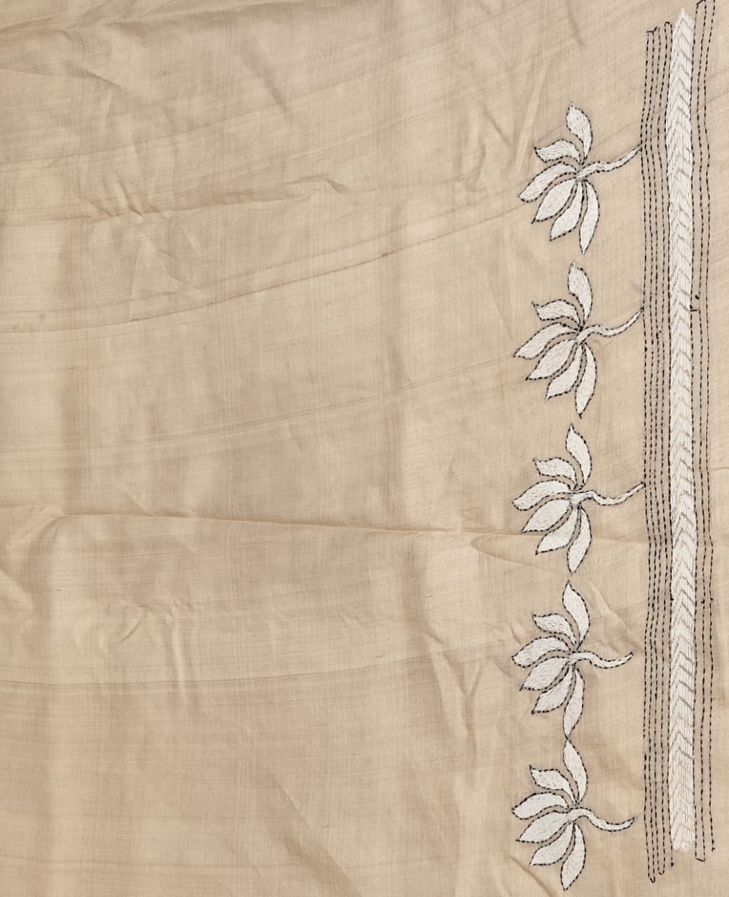 Beige Tussar embroidery saree with kantha work border and matching unstitched blouse, traditional wear by Saarang Sarees.