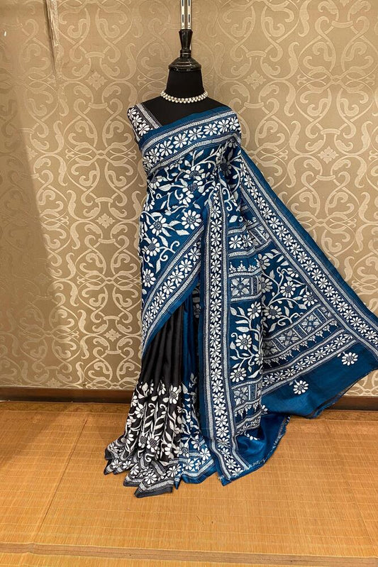 Deep teal blue Tussar embroidery saree with Kantha work border and matching unstitched blouse, traditional Indian wear by Saarang Sarees.
