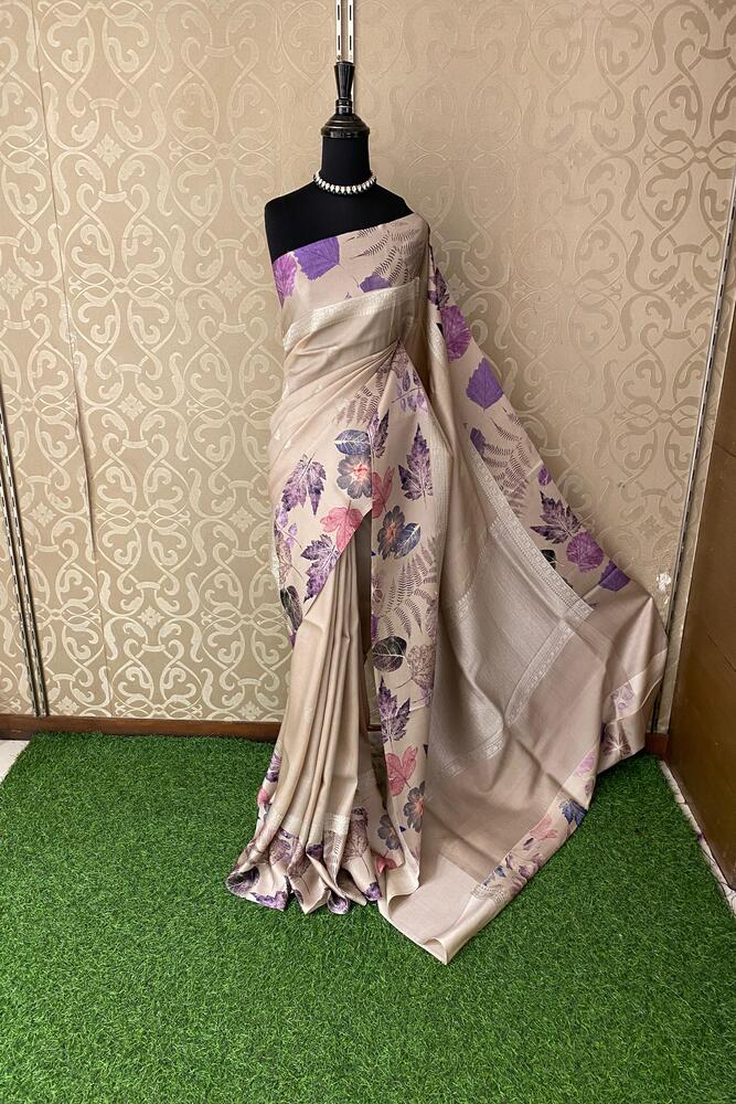 Beige Tussar Banarasi saree with digital mashru border, traditional wear from Saarang Sarees, showcasing intricate weave and elegant design.