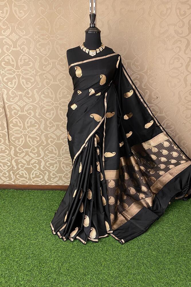 Black Katan Mashru Silk Banarasi saree by Saarang Sarees with intricate gold zari work and unstiched matching blouse.