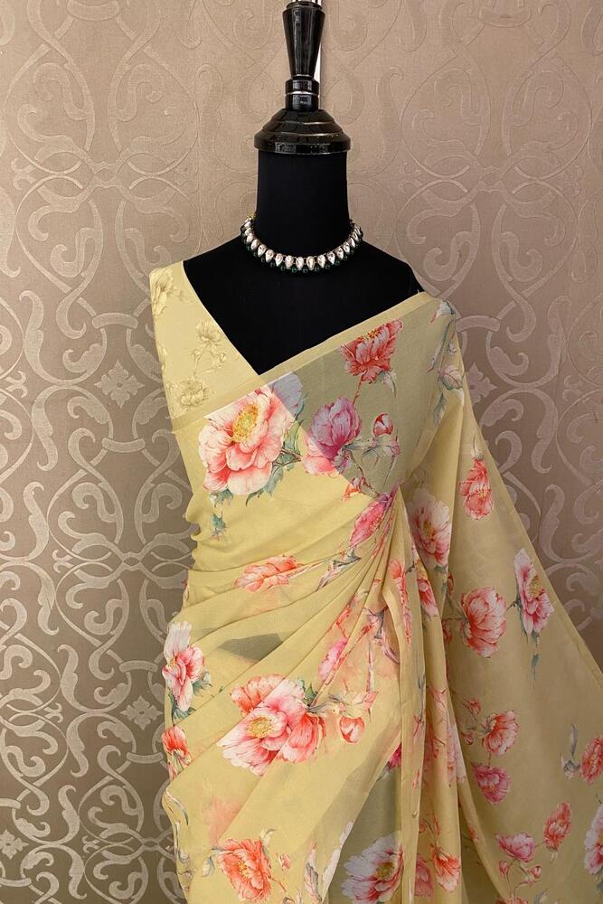 Yellow floral printed chiffon saree with unstiched blouse piece, perfect for party wear by Saarang Sarees displayed on a model.