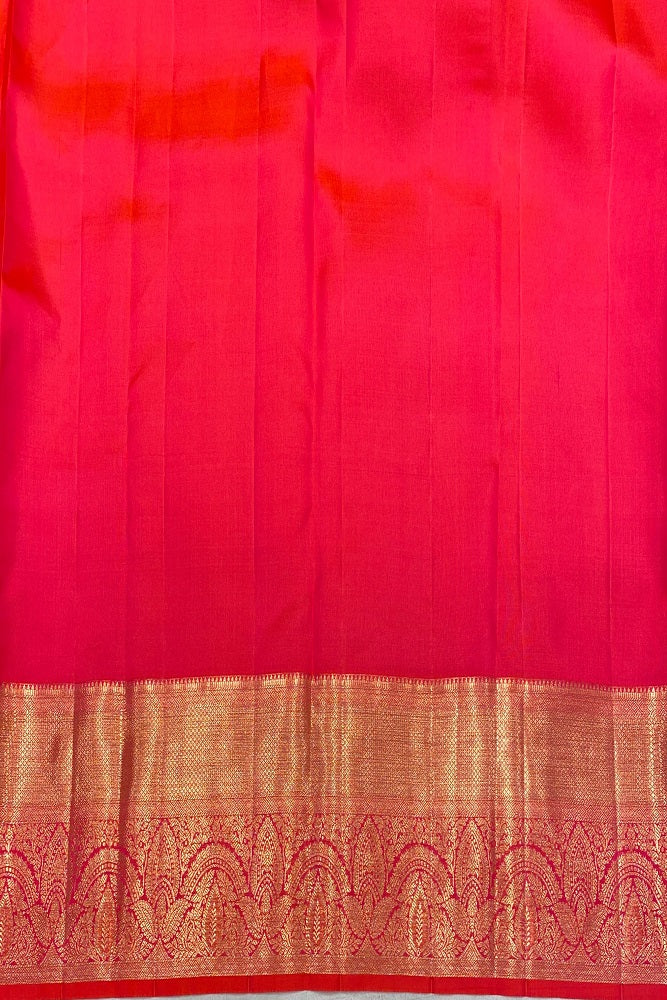Cherry red Pure Kanjeevaram silk saree with intricate gold zari work and matching unstiched blouse, traditional Indian wear.