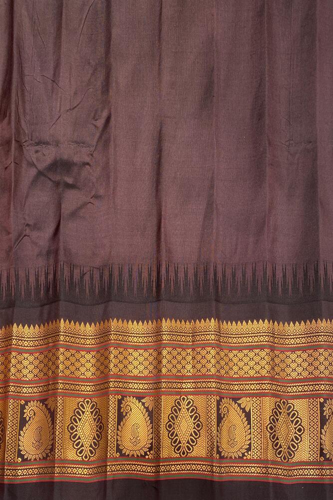 Off-White Gadwal silk saree with intricate patterns and matching unstiched blouse, traditional wear from Saarang Sarees.
